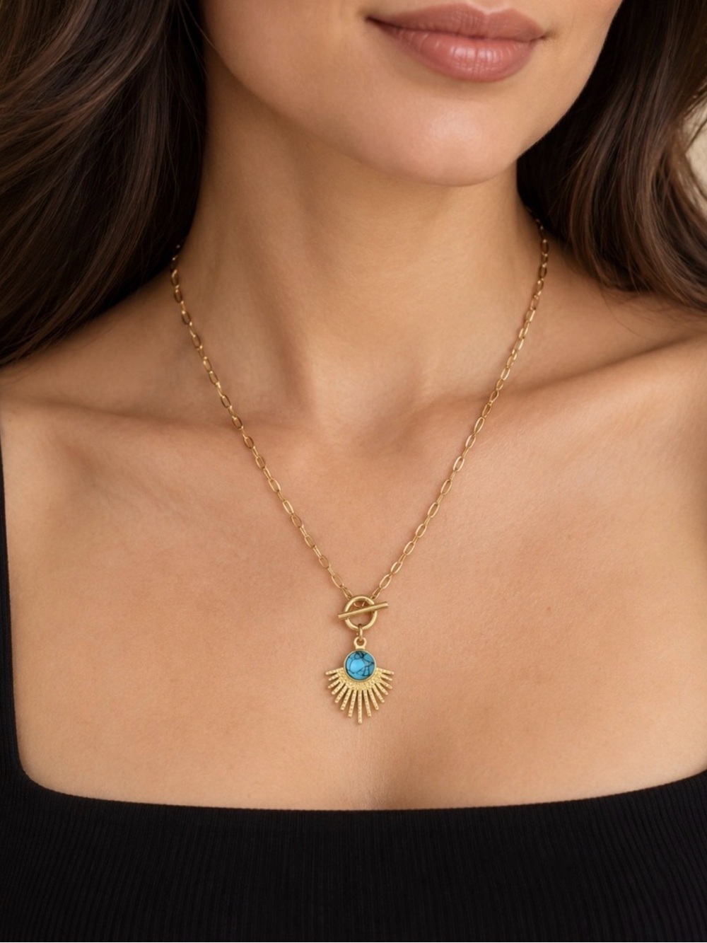 Gold Sunburst Pendant Necklace with Turquoise Stone